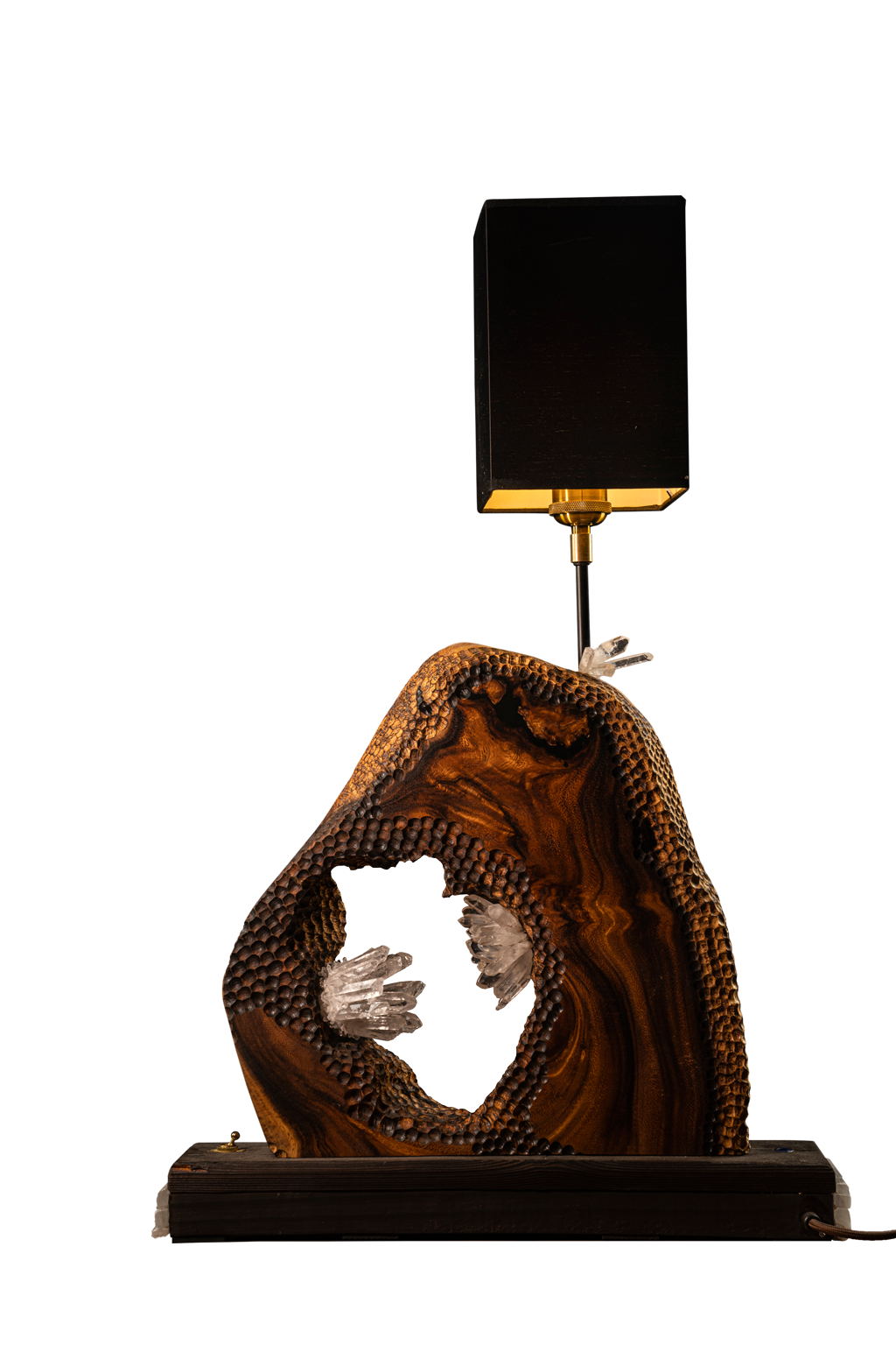 A table lamp with an wood carving